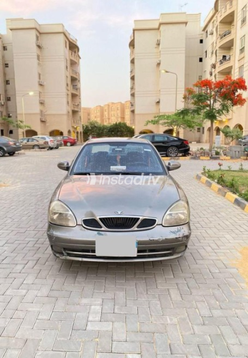 دايو نوبيرا 2 2001 ذهبي يدوي مستعملة للبيع في حدائق اكتوبر - 1
