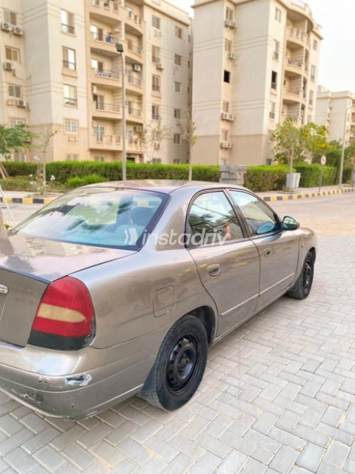 دايو نوبيرا 2 2001 ذهبي يدوي مستعملة للبيع في حدائق اكتوبر - 9