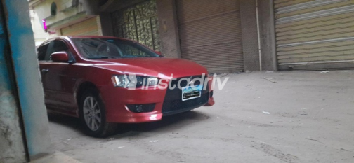 ميتسوبيشي لانسر اى اكس شارك 2015 أحمر أوتوماتيك مستعملة للبيع في الشرقية - 2
