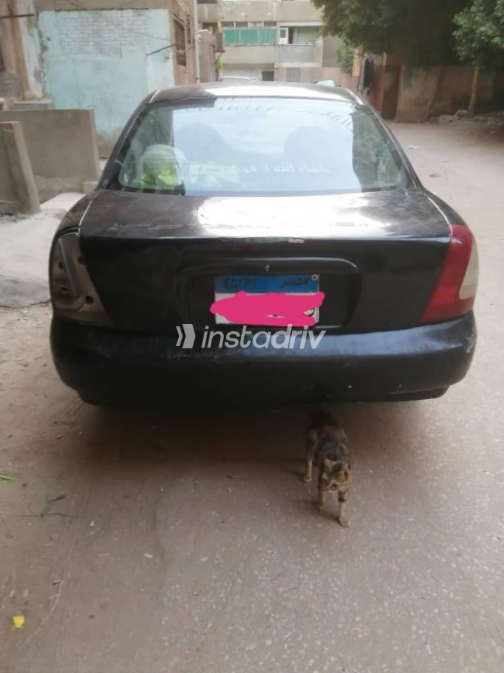 Daewoo Nubira 1977 Black Manual Used for Sale in Helwan - 1
