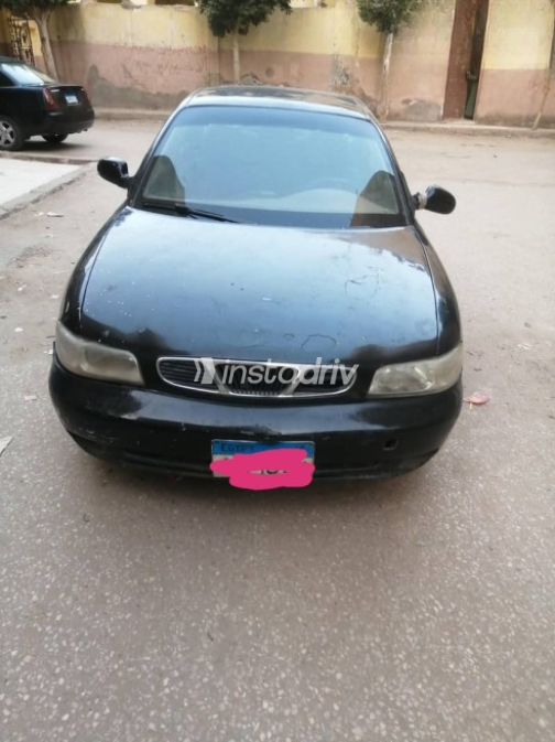Daewoo Nubira 1977 Black Manual Used for Sale in Helwan - 2