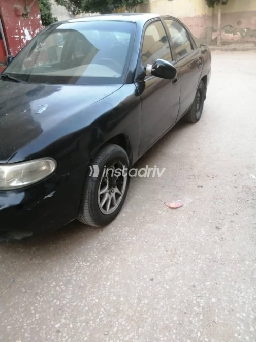 Daewoo Nubira 1977 Black Manual Used for Sale in Helwan - 4
