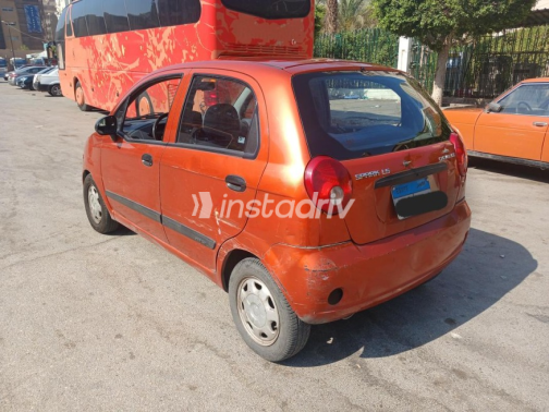 Chevrolet Spark 2009 Orange Manual Used for Sale in Nasr city - 3