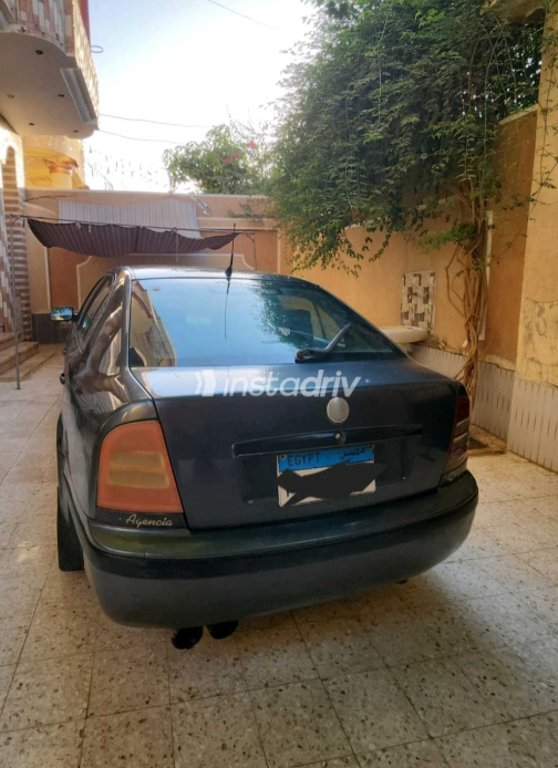 سكودا اوكتافيا 2009 رمادي غامق يدوي مستعملة للبيع في أسيوط - 1