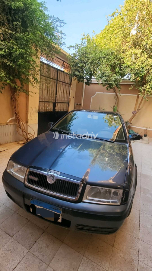 سكودا اوكتافيا 2009 رمادي غامق يدوي مستعملة للبيع في أسيوط - 9
