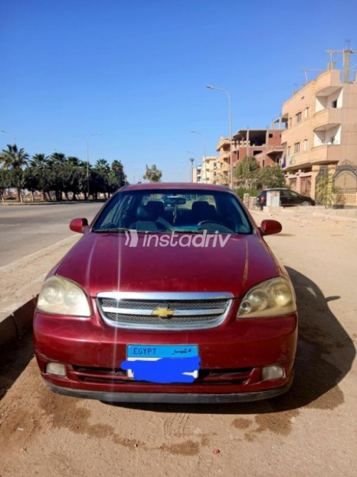 Chevrolet Optra 2009 Dark Red Automatic Used for Sale in Mit Ghamr - 1