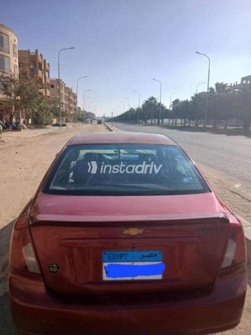 Chevrolet Optra 2009 Dark Red Automatic Used for Sale in Mit Ghamr - 2