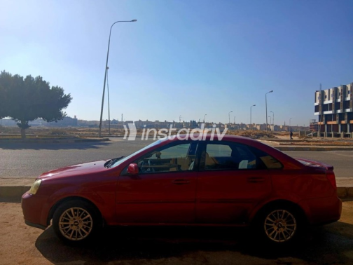 Chevrolet Optra 2009 Dark Red Automatic Used for Sale in Mit Ghamr - 3