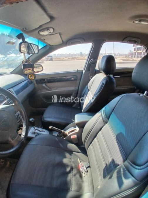 Chevrolet Optra 2009 Dark Red Automatic Used for Sale in Mit Ghamr - 5