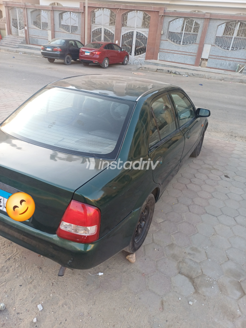 مازدا 323 1999 أخضر يدوي مستعملة للبيع في القليوبية‎‎ - 1