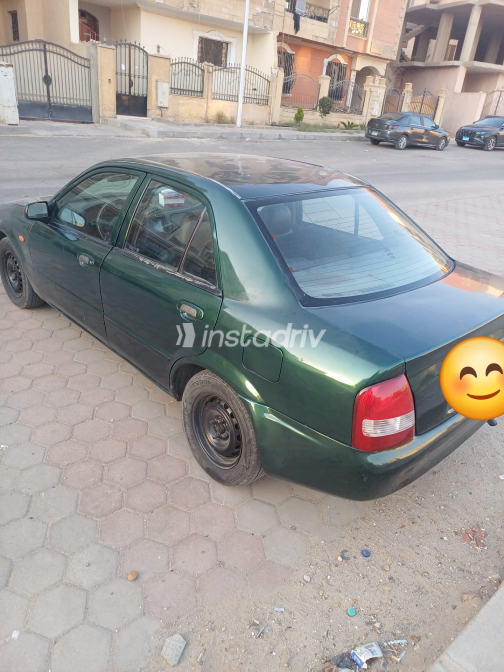 مازدا 323 1999 أخضر يدوي مستعملة للبيع في القليوبية‎‎ - 2