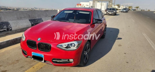 بي ام دبليو 118 2015 أحمر أوتوماتيك مستعملة للبيع في المقطم - 1