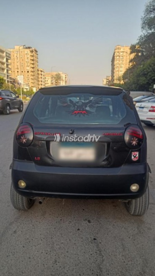 Chevrolet Spark 2011 Black Manual Used for Sale in Heliopolis - 4