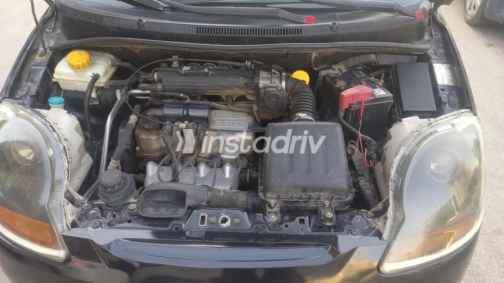 Chevrolet Spark 2011 Black Manual Used for Sale in Heliopolis - 8