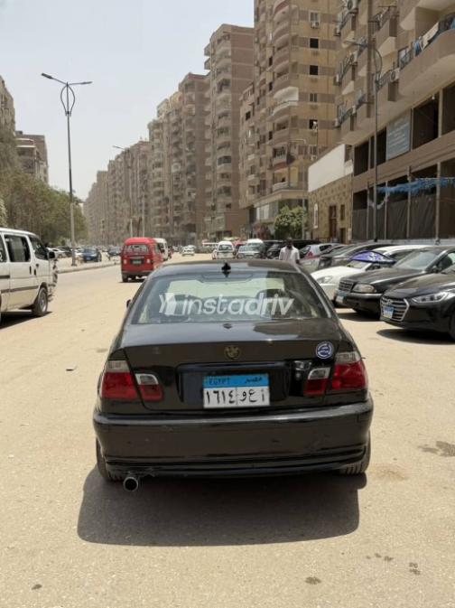 بي ام دبليو 318 1999 أسود أوتوماتيك مستعملة للبيع في الجيزة - 6