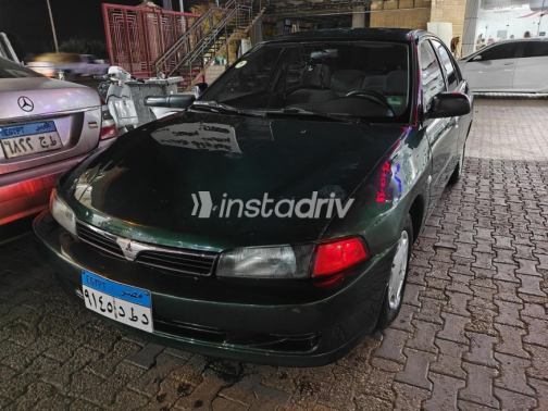 ميتسوبيشي ميراج 1999 أخضر غامق أوتوماتيك مستعملة للبيع في طنطا - 2