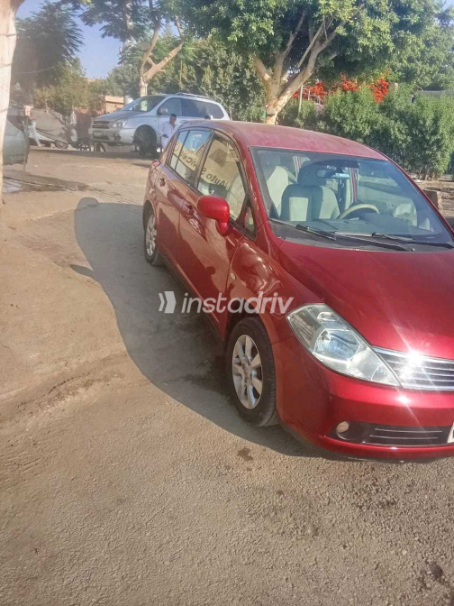 Nissan Tiida 2007 Red Manual Used for Sale in Nasr city - 2