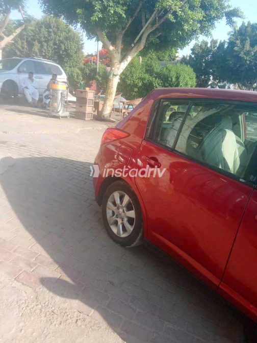 Nissan Tiida 2007 Red Manual Used for Sale in Nasr city - 5