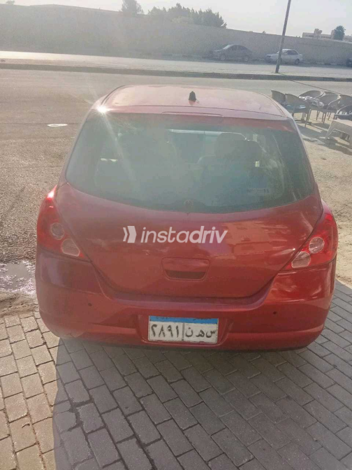 Nissan Tiida 2007 Red Manual Used for Sale in Nasr city - 6