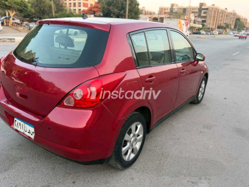 Nissan Tiida 2007 Red Manual Used for Sale in Nasr city - 7