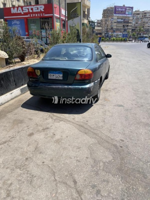 Kia Sephia 1999 Dark Green Automatic Used for Sale in Heliopolis - 1