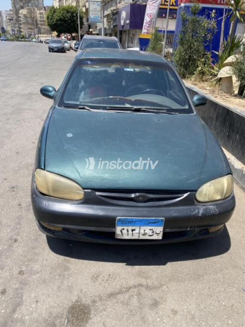 Kia Sephia 1999 Dark Green Automatic Used for Sale in Heliopolis - 2