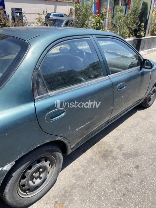 Kia Sephia 1999 Dark Green Automatic Used for Sale in Heliopolis - 3