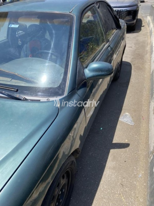 Kia Sephia 1999 Dark Green Automatic Used for Sale in Heliopolis - 4