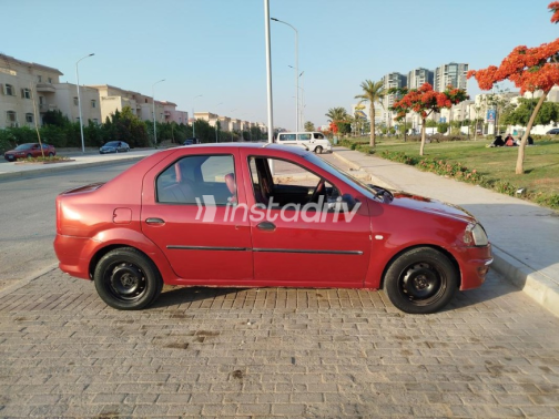 Renault Logan 2010 Red Manual Used for Sale in 6 October - 2