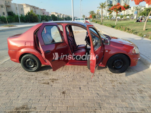 Renault Logan 2010 Red Manual Used for Sale in 6 October - 4