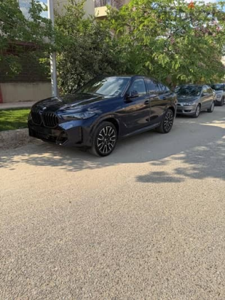 بي ام دبليو X6 2025 أزرق غامق أوتوماتيك جديدة للبيع في القاهرة الكبرى ( القاهرة - الجيزة)