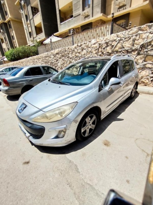 بيجو 308 sw 2011 فضي أوتوماتيك مستعملة للبيع في مدينة نصر