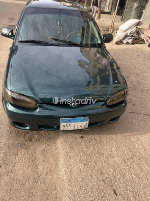 Hyundai Accent 1999 Green Manual Used for Sale in Greater Cairo ( Cairo + Giza) - 1