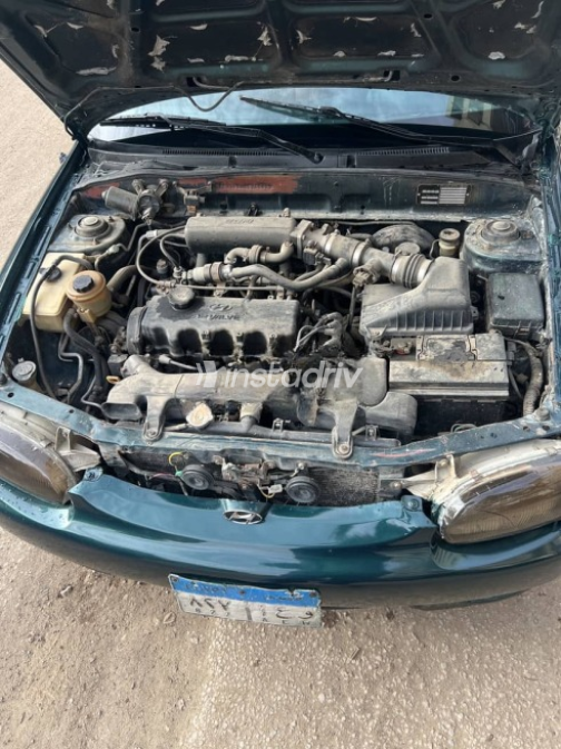 Hyundai Accent 1999 Green Manual Used for Sale in Greater Cairo ( Cairo + Giza) - 4