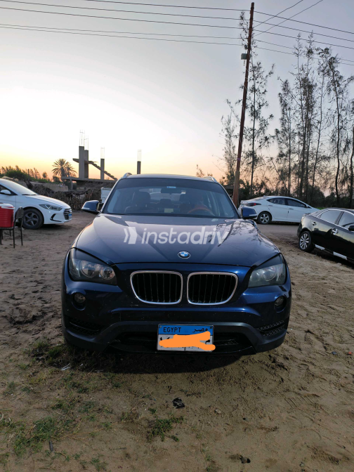 بي ام دبليو X1 2014 أبيض أوتوماتيك مستعملة للبيع في مدينة السادات - 1