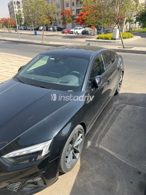 اودي A5 2024 أسود أوتوماتيك مستعملة للبيع في مدينتى - 2