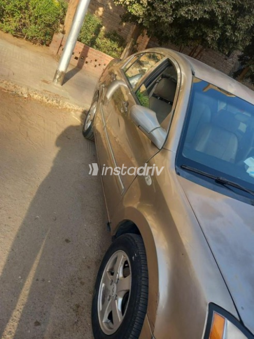 اسبيرانزا A516 2009 ذهبي يدوي مستعملة للبيع في مدينة نصر - 1