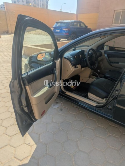 Chevrolet Aveo 2013 Black Automatic Used for Sale in Hadayek October - 3