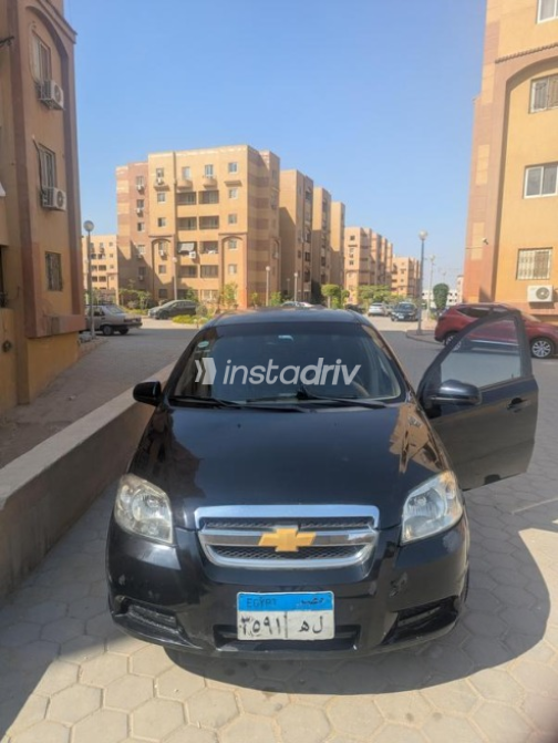 Chevrolet Aveo 2013 Black Automatic Used for Sale in Hadayek October - 6