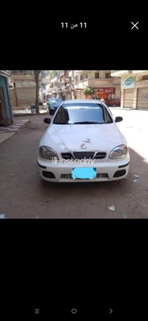 دايو لانوس 2002 أبيض يدوي مستعملة للبيع في المنصورة - 2