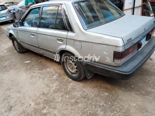 Mazda 323 1990 Silver Automatic Used for Sale in Greater Cairo ( Cairo + Giza) - 5