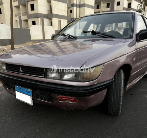 ميتسوبيشي لانسر 1990 بنفسجي يدوي مستعملة للبيع في حدائق اكتوبر - 2