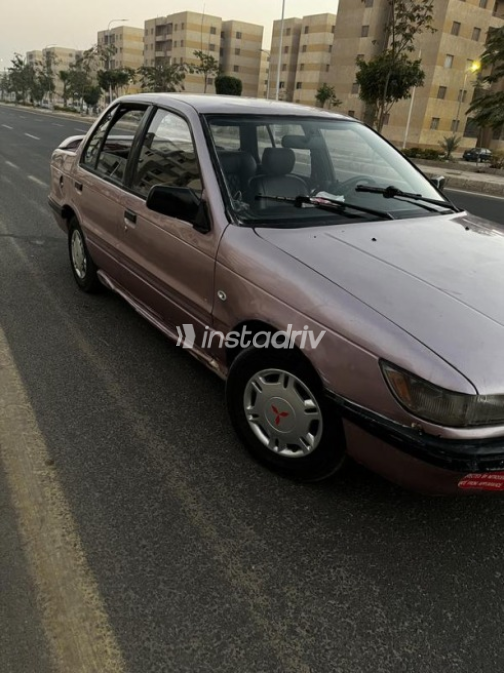 ميتسوبيشي لانسر 1990 بنفسجي يدوي مستعملة للبيع في حدائق اكتوبر - 3