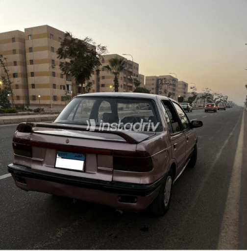 ميتسوبيشي لانسر 1990 بنفسجي يدوي مستعملة للبيع في حدائق اكتوبر - 4