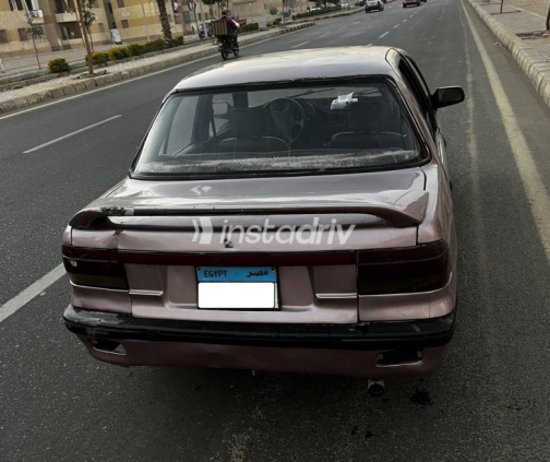 ميتسوبيشي لانسر 1990 بنفسجي يدوي مستعملة للبيع في حدائق اكتوبر - 5