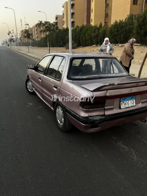 ميتسوبيشي لانسر 1990 بنفسجي يدوي مستعملة للبيع في حدائق اكتوبر - 6