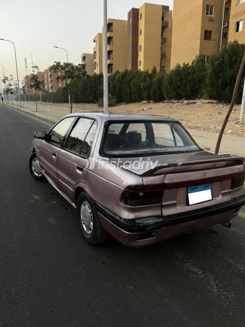 ميتسوبيشي لانسر 1990 بنفسجي يدوي مستعملة للبيع في حدائق اكتوبر - 7