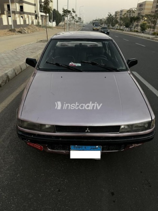 ميتسوبيشي لانسر 1990 بنفسجي يدوي مستعملة للبيع في حدائق اكتوبر - 10