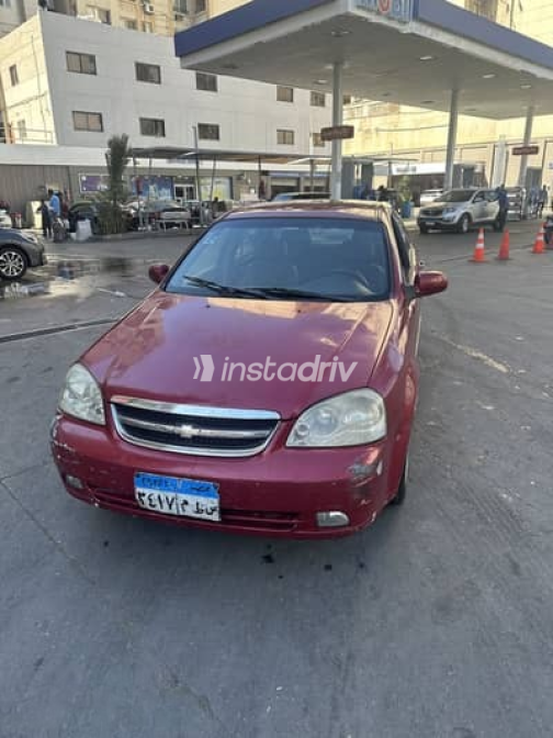 Chevrolet Optra 2011 Burgundy Automatic Used for Sale in Alexandria - 1