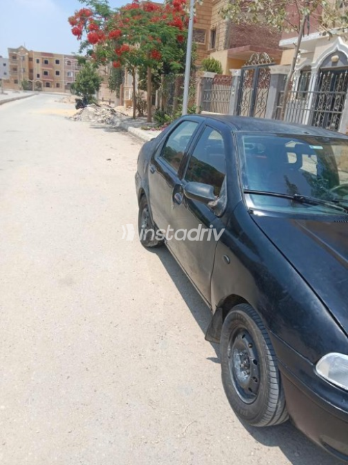 Fiat Siena 2002 Black Manual Used for Sale in Hadayek October - 2